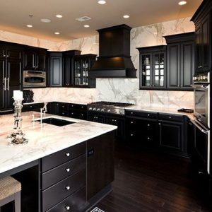 black-cabinets-with-calacata-gold-backsplash-and-countertops